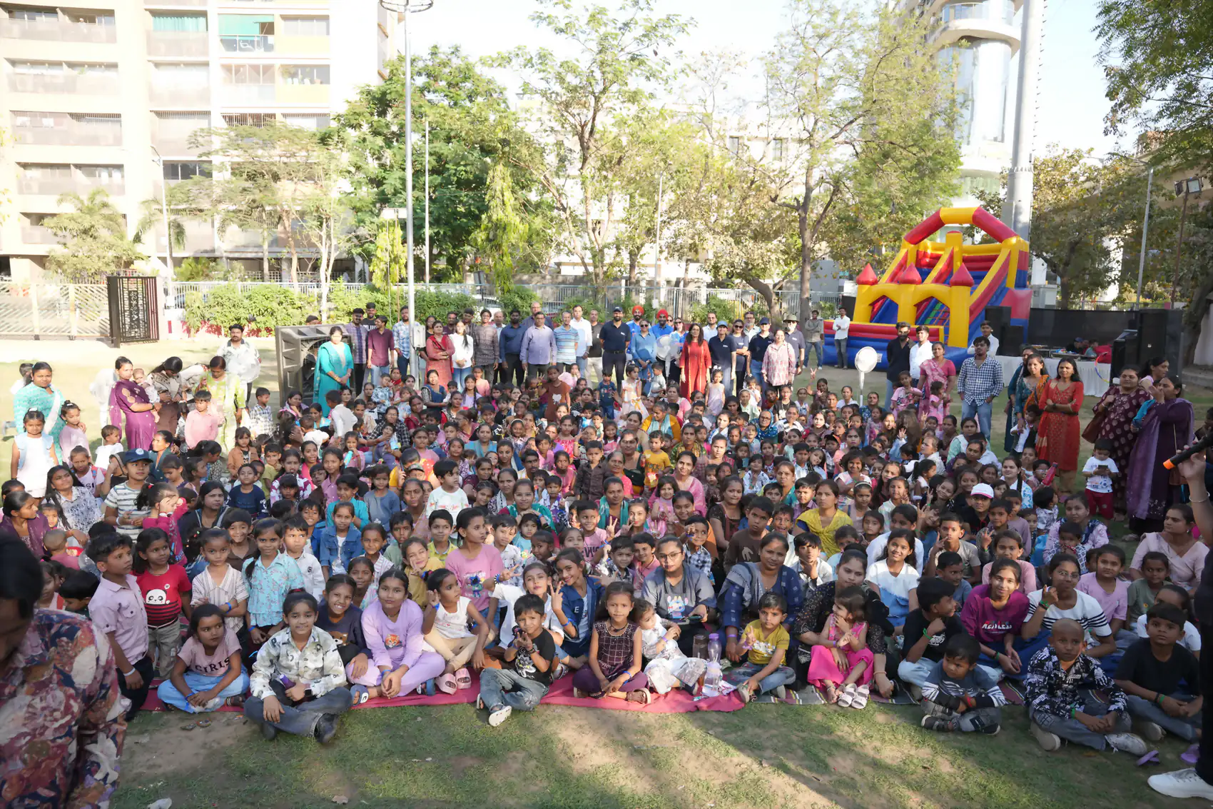 Children and families of the पंख daycare centres gathered at a Foundation event